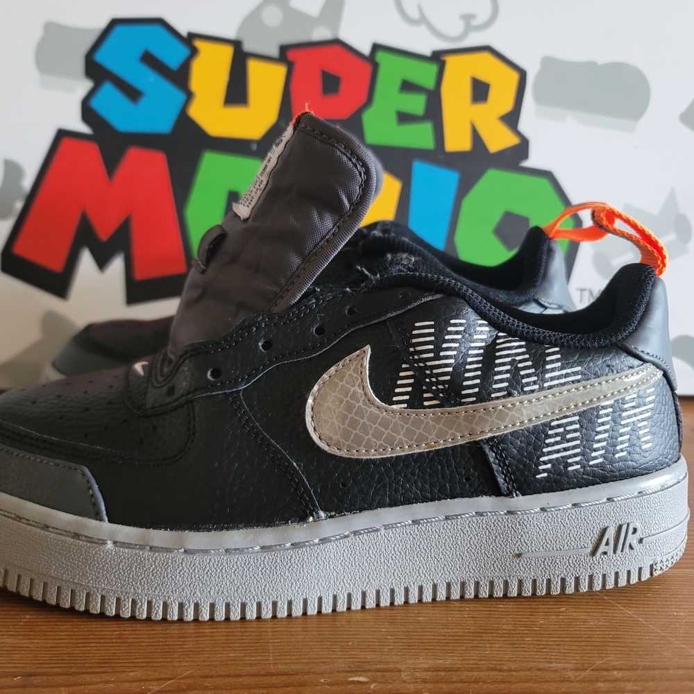 Black and Silver Nike Sneakers